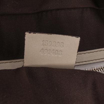 Gucci Large GG Canvas Wave Handbag Brown