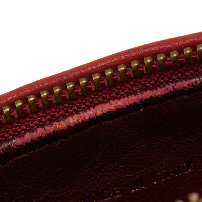 Chanel sac à bandoulière rond rouge matelassé à franges et pompons