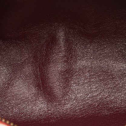 Chanel sac à bandoulière rond rouge matelassé à franges et pompons