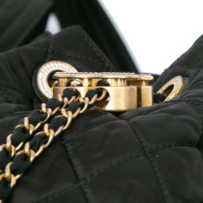 Chanel Quilted Nylon Crystal CC Drawstring Sling Bag Black