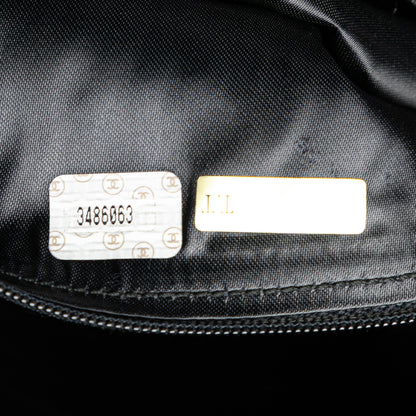 Chanel CC Quilted Lambskin Tassel Crossbody Black