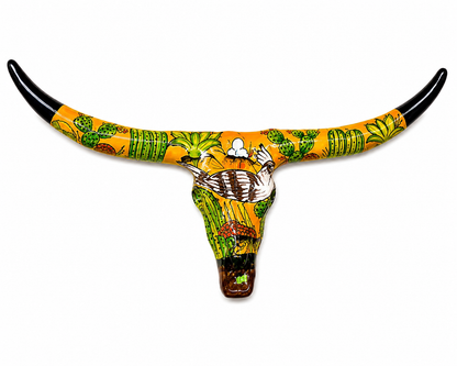 Decorative bull skull with colorful patterns on a white background