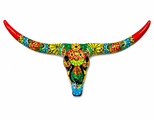 Colorful bull skull with long red horns on a white background