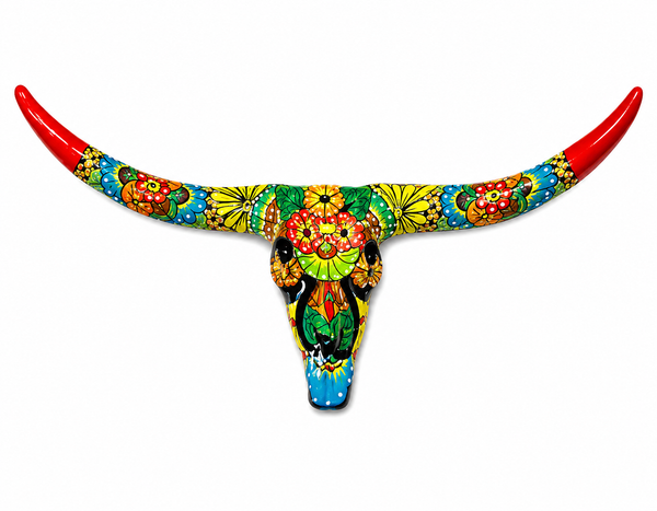 Colorful bull skull with long red horns on a white background